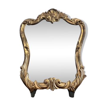 Miroir de style rocaille .