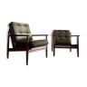 Two Scandinavian solid teak armchairs