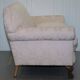 Victorian suite in damask, walnut frame, legs carved in lion's paw.
