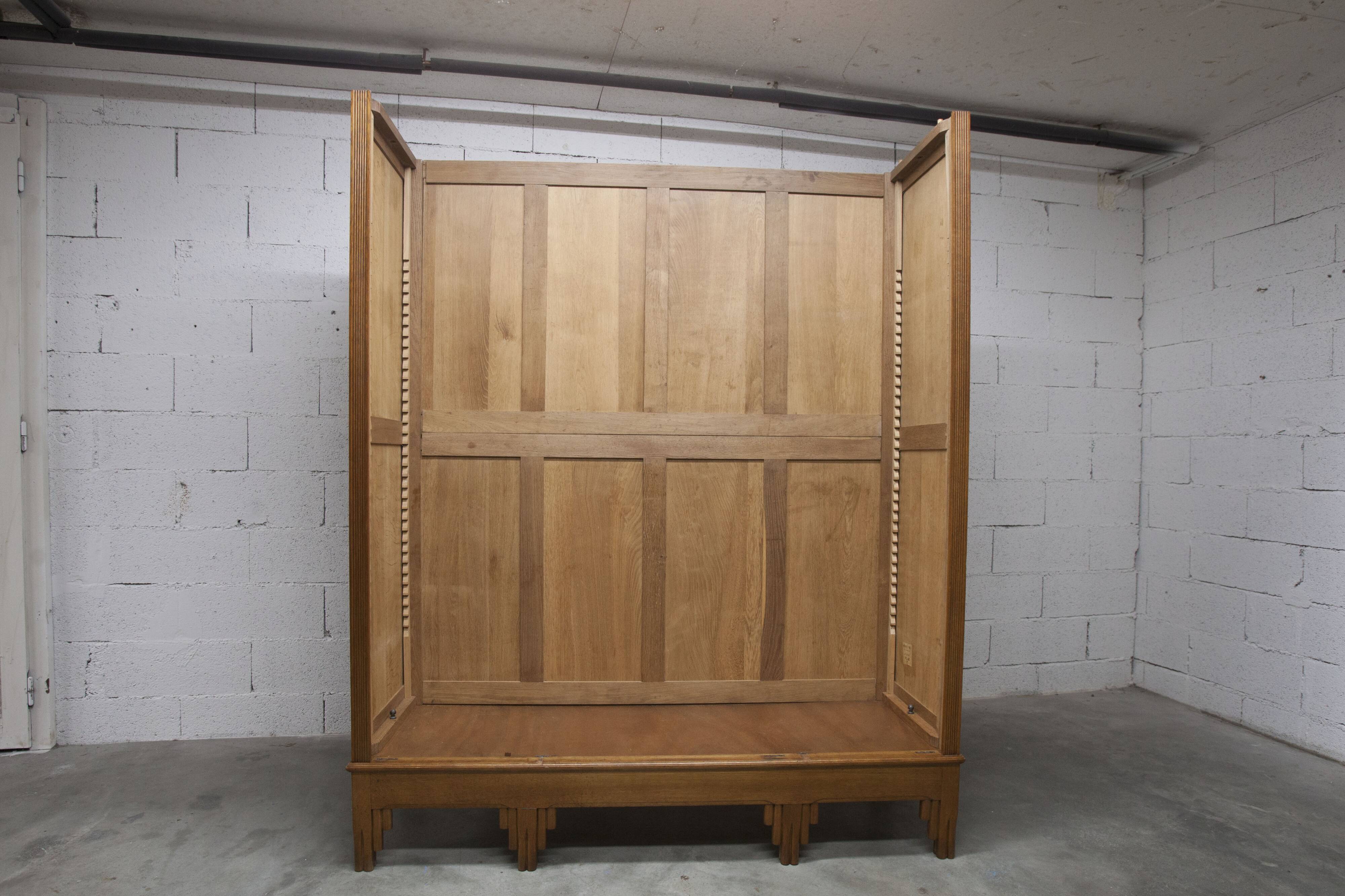 Art Deco carved oak wardrobe - Flemish workshop circa 1930