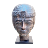 Head of a stone woman