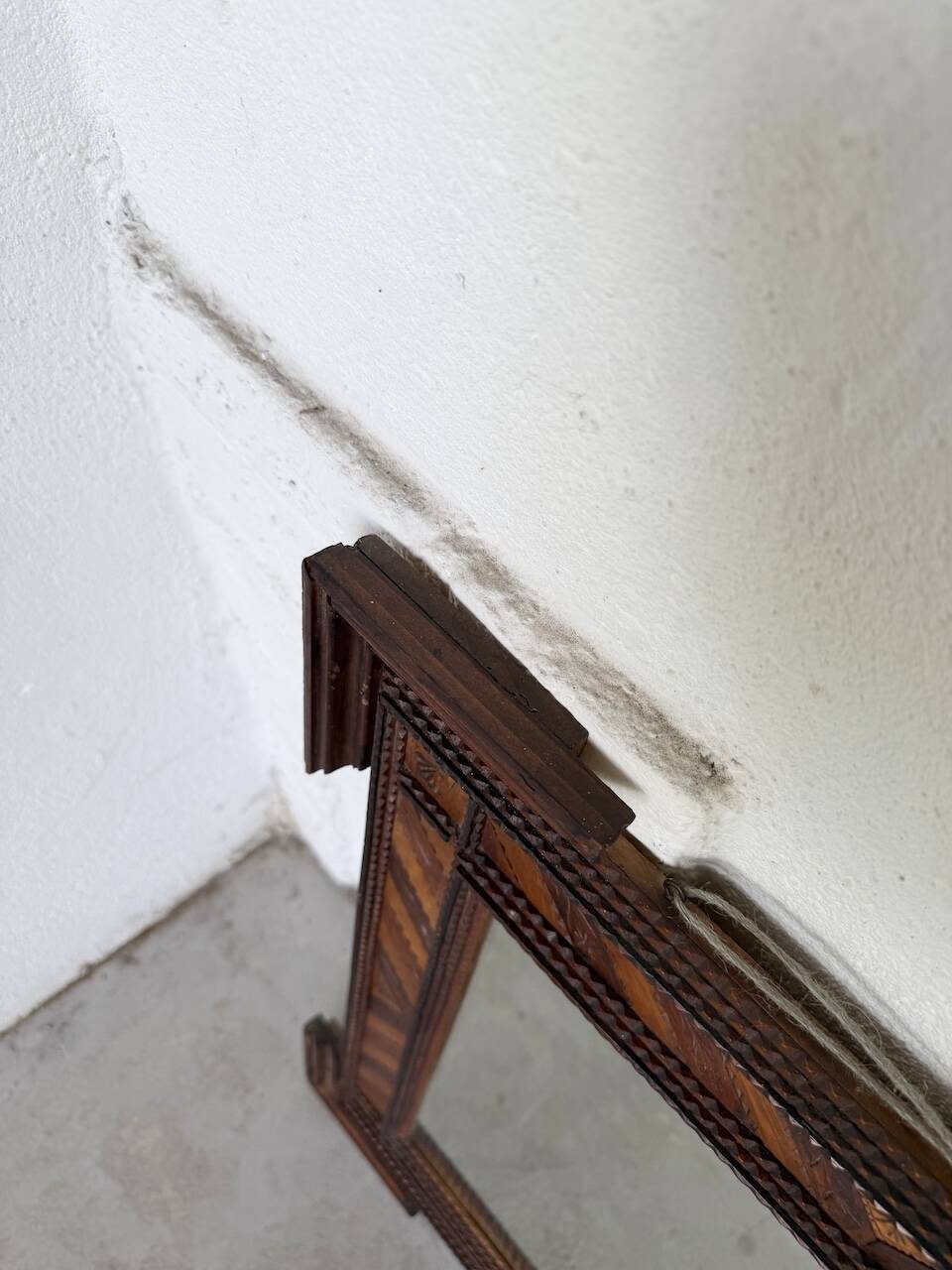 Pair of wooden mirrors in tramp art style