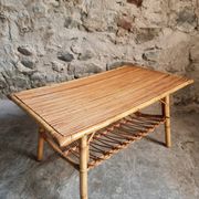 Vintage bamboo and rattan coffee table with magazine rack, French, circa 1960–1970.