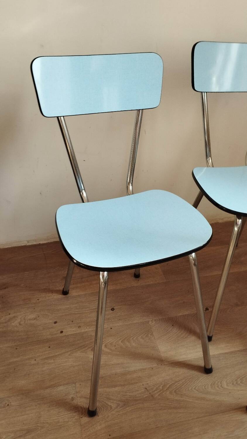 4 blue Formica chairs