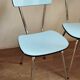 4 blue Formica chairs
