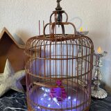 Old bird cage made of bamboo and wood
