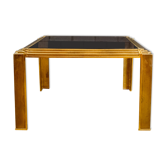 Coffee table made of brass and glass.