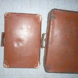Pair of red suitcases from the 1950s