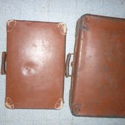 Pair of red suitcases from the 1950s