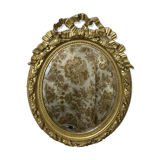 Miroir ancien ovale doré – style Louis XVI avec nœud ruban