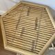 Set of three vintage rattan side tables.