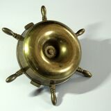 1960s solid brass ashtray in the shape of a steering wheel with a candle stick, vintage
