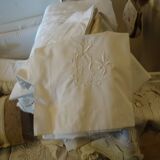 Embroidered sheet and 2 assorted piles