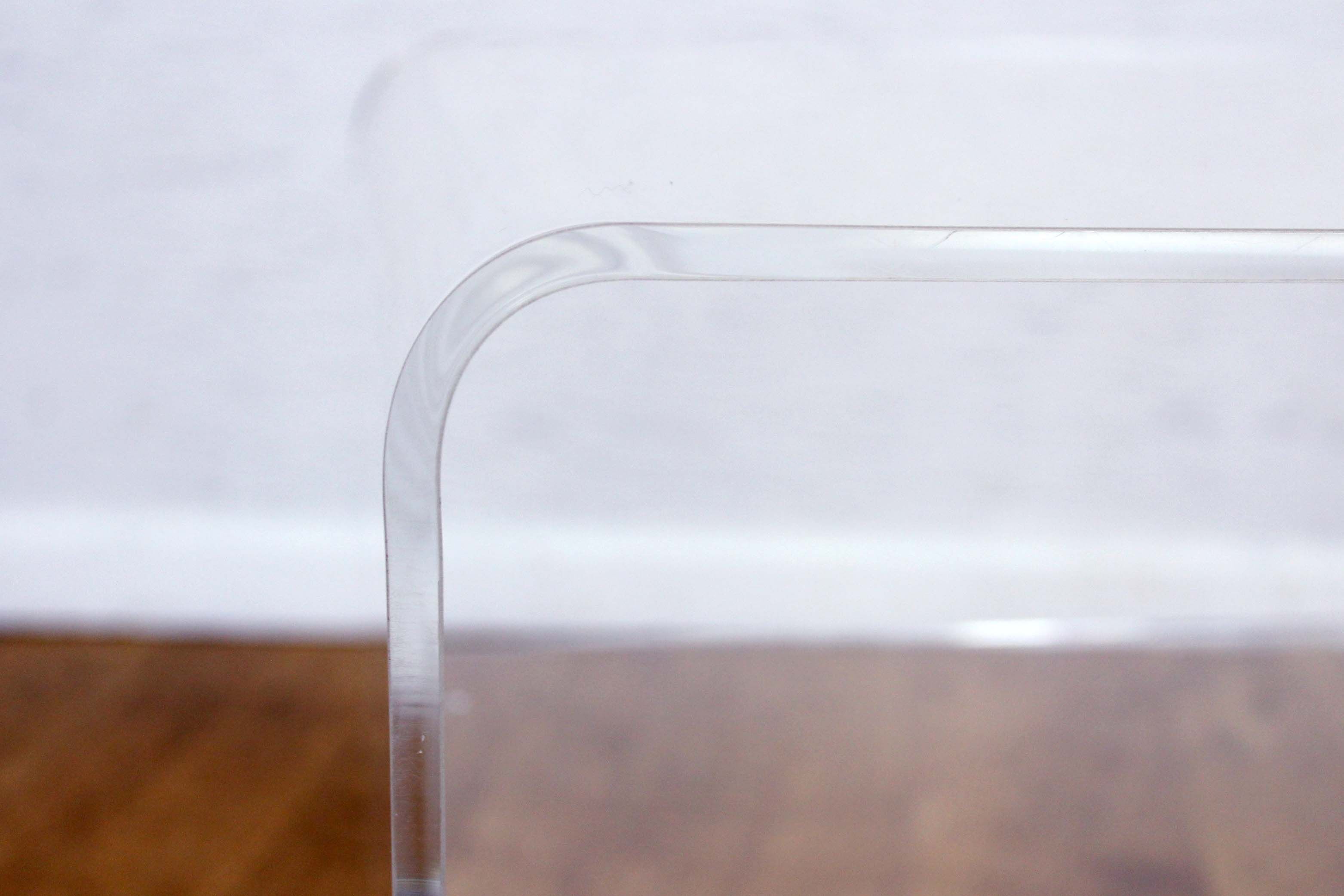 Plexiglas coffee table with vinyl compartment and magazines rack