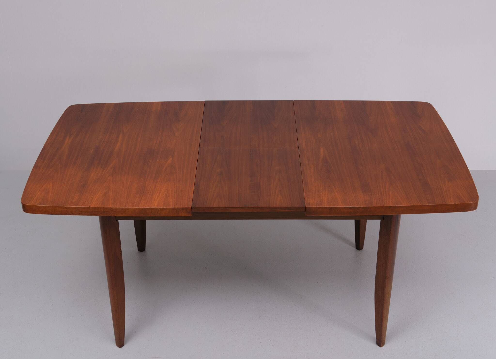 Extendable dining table in walnut wood by Jindrich Halabala 1960