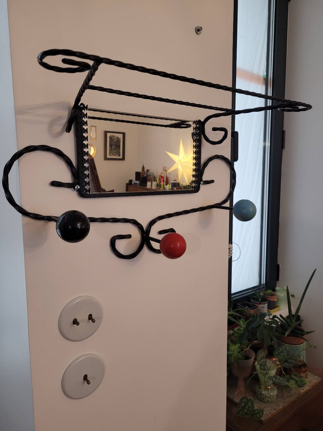 Wrought iron coat rack