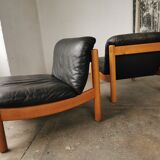 Pair of designer leather armchairs 80s