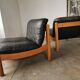 Pair of designer leather armchairs 80s