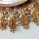 Oval sun mirror in vintage gilded brass 1960