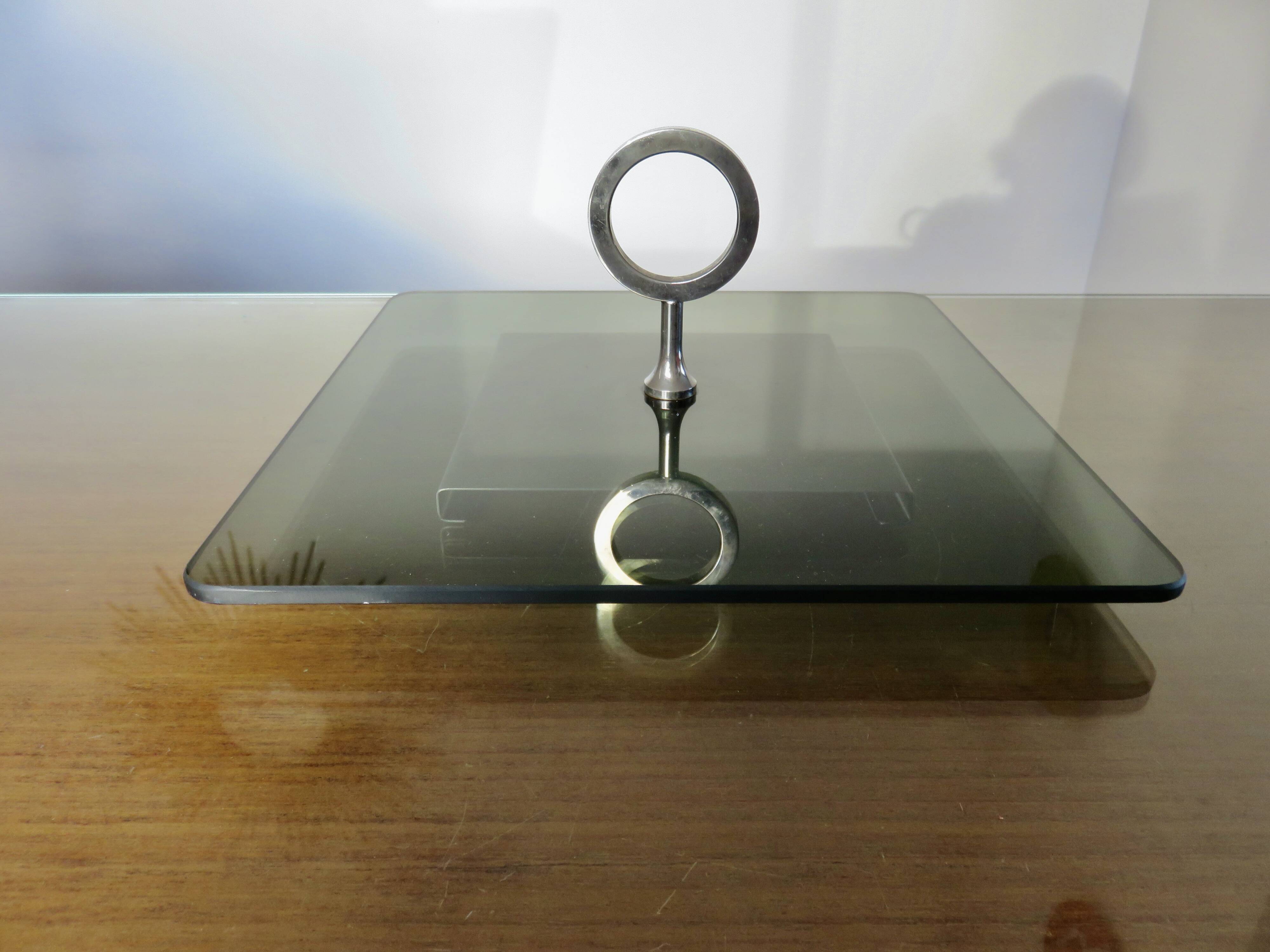 Modernist revolving serving tray, in smoked glass and silver-plated metal, 70.
