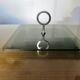 Modernist revolving serving tray, in smoked glass and silver-plated metal, 70.