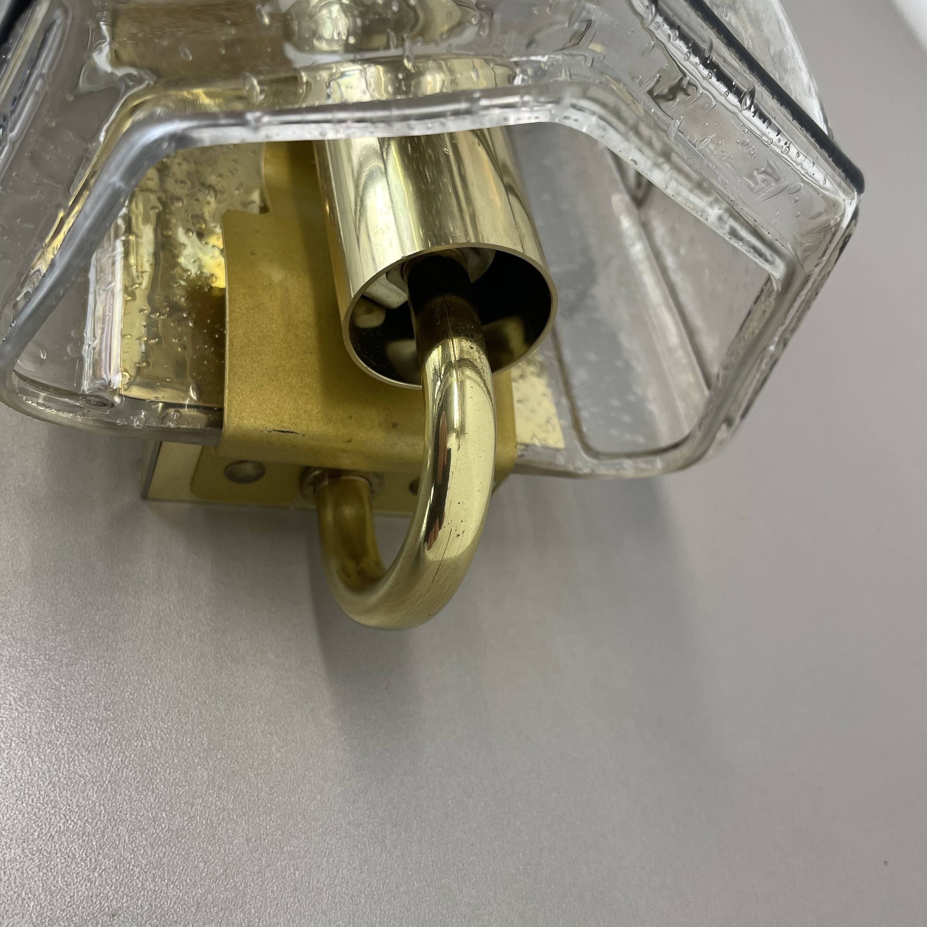 Wall light "Iron Rings" in brass and glass by Glashütte Limburg, Germany, 1970s