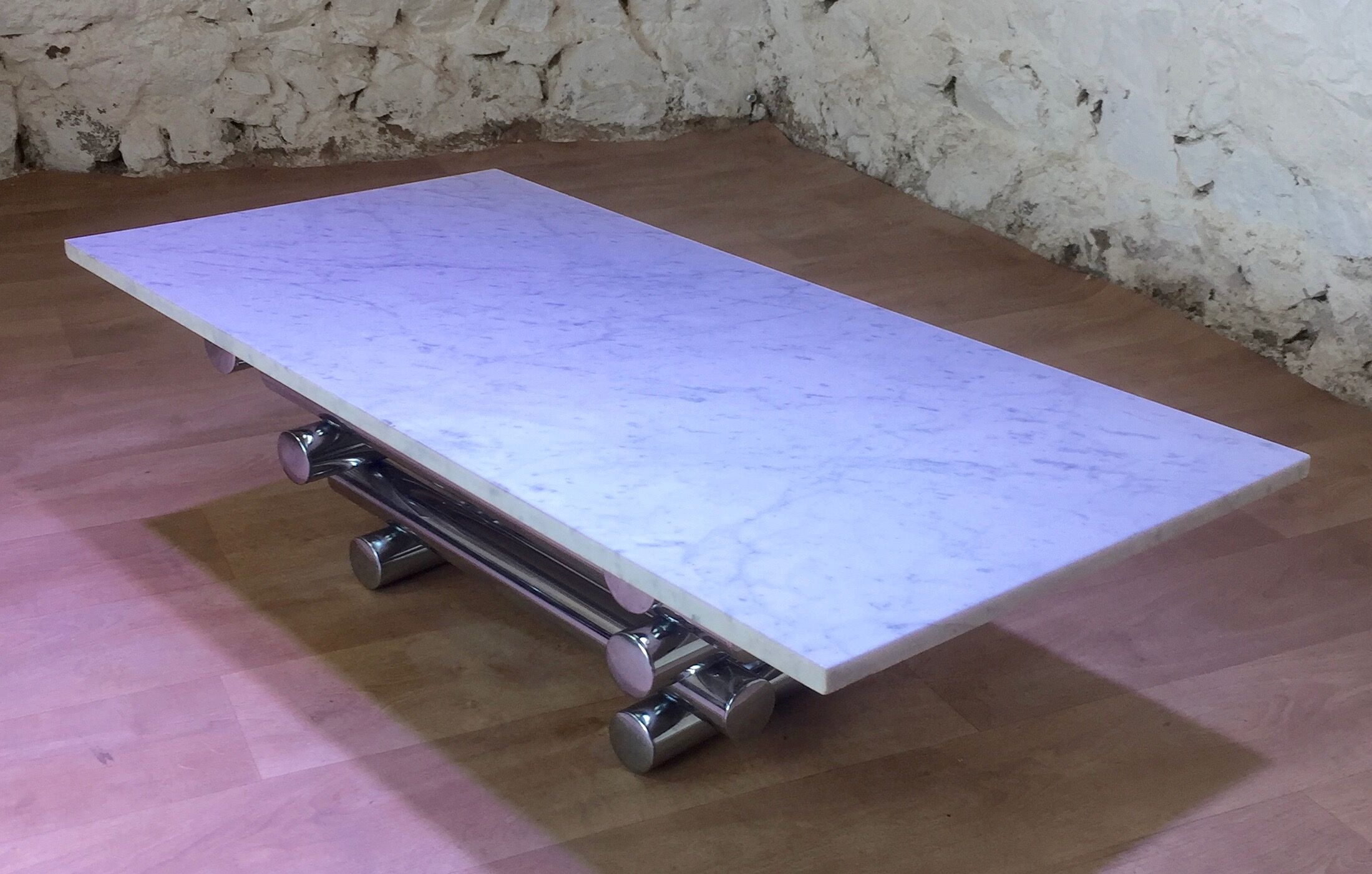 Coffee table with steel tube structure and marble top