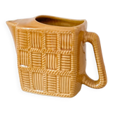 Barbotine ceramic pitcher
