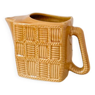 Barbotine ceramic pitcher