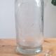 Bouteille ancienne en verre soufflé