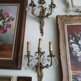 Pair of bronze and crystal sconces