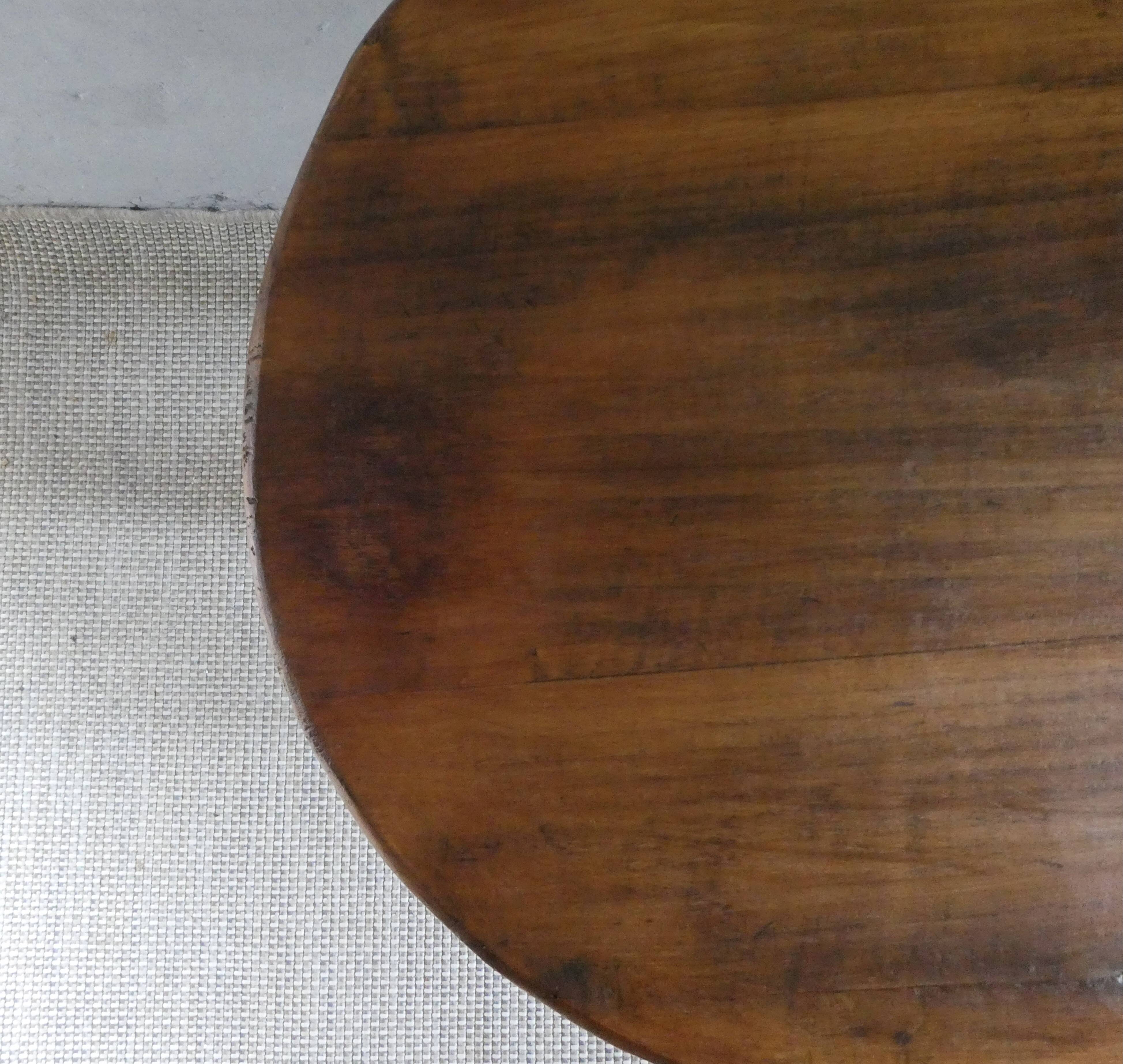 Small table known as a winemaker's table.