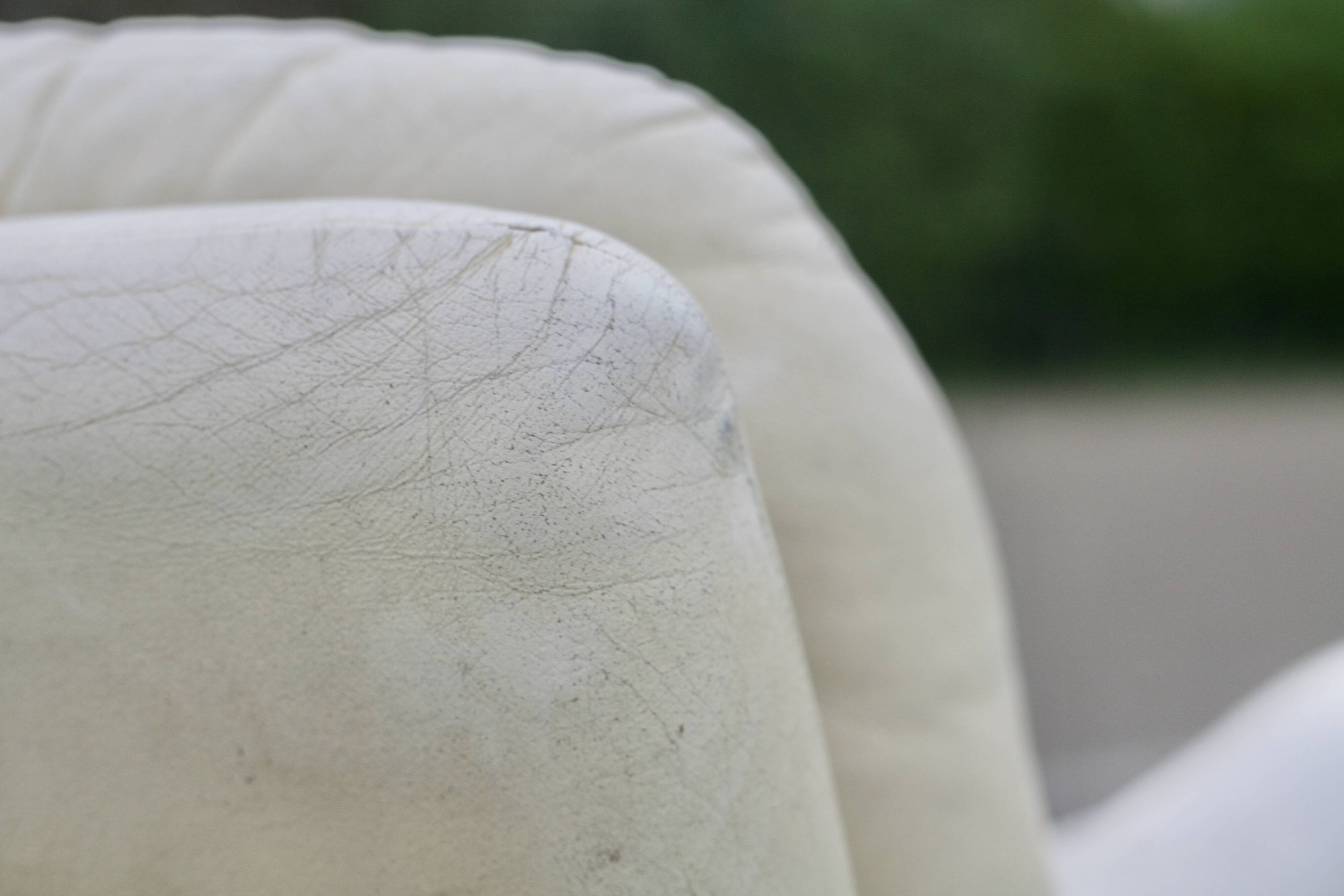 Pair of leather “space age” armchairs. Cream colour". Circa 1970.