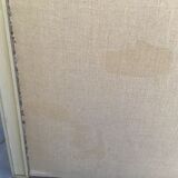 Patinated wood and linen headboard