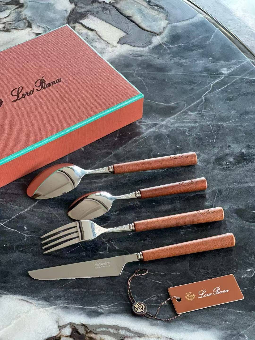 Loro Piana 4-piece mahogany knife and fork set