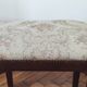 Footrest, vintage stool in solid oak with floral upholstery.