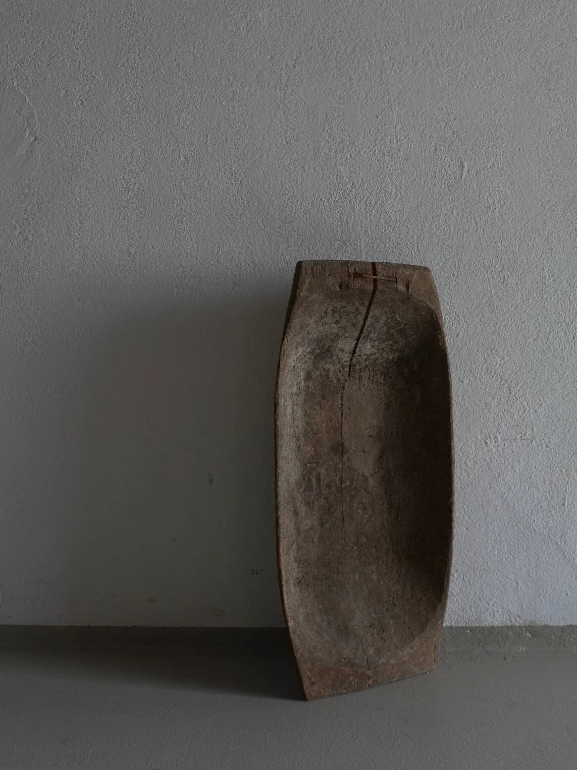 Small rustic carved wooden bowl