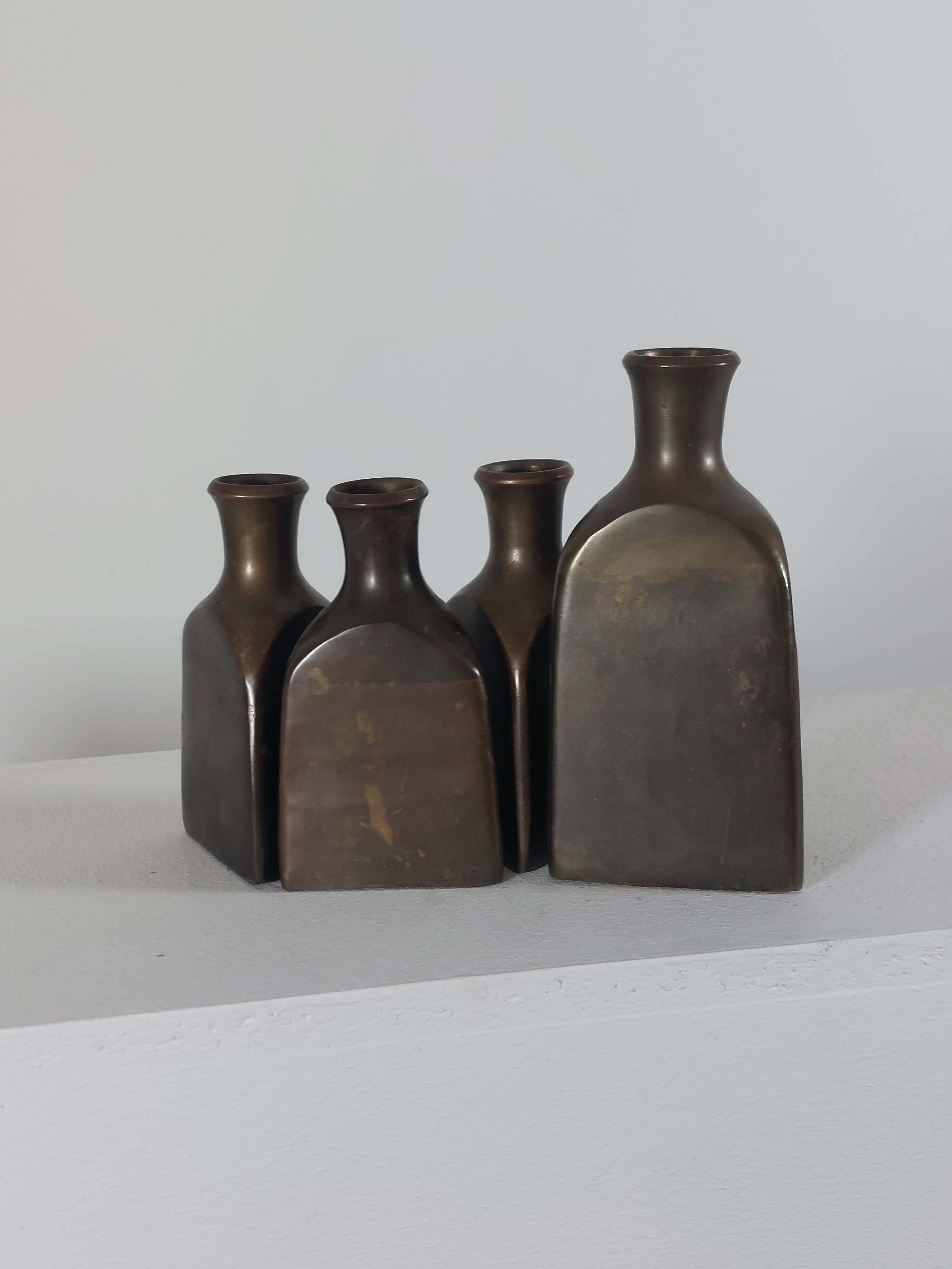 Vintage mid century Set of four triangular brass vases