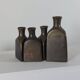 Vintage mid century Set of four triangular brass vases