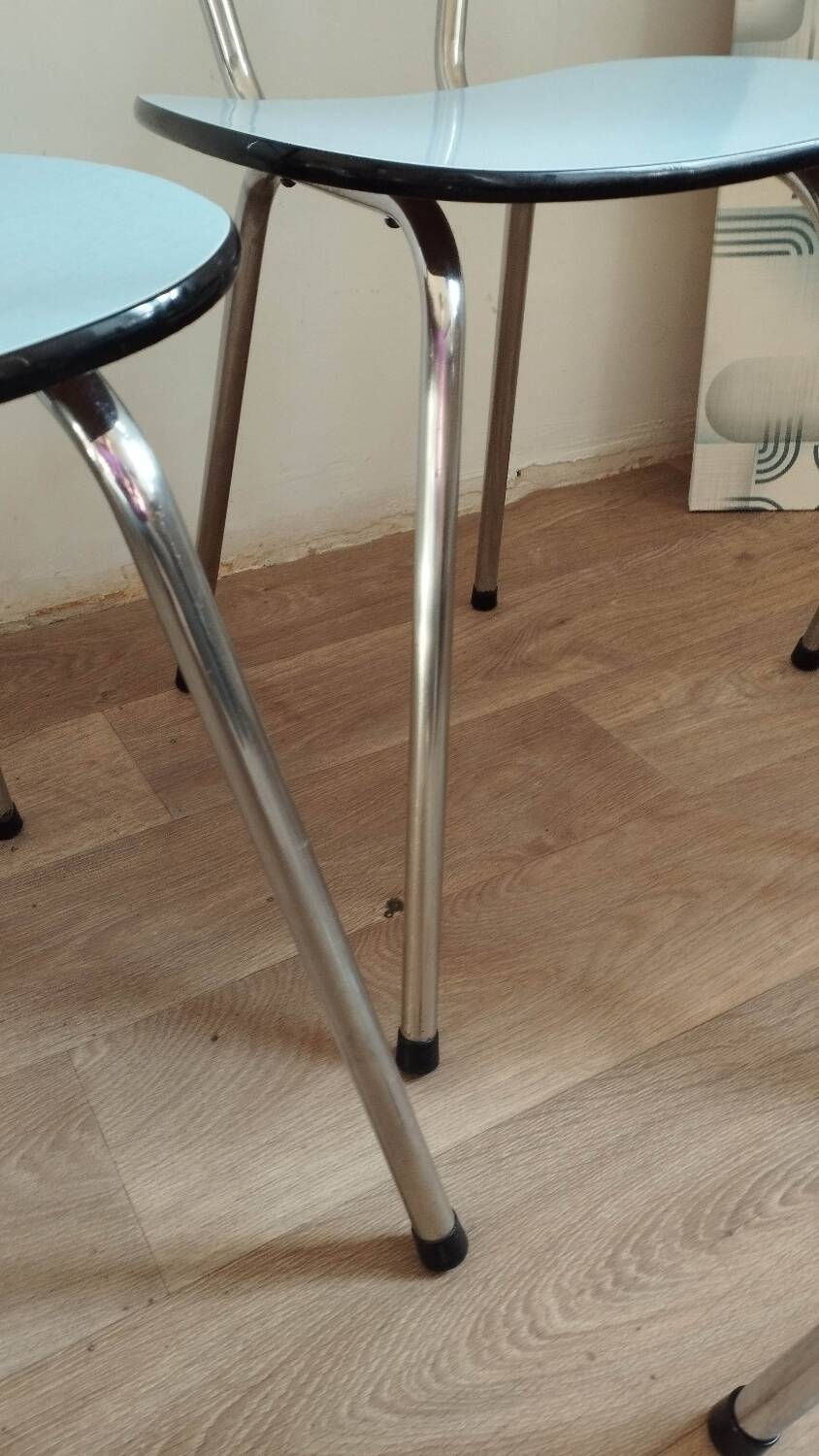 4 blue Formica chairs