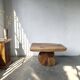 Organic brutalist coffee table in solid cedar, trunk pedestal, 1970s.