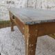 Patinated coffee table with a drawer