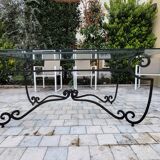 Large rectangular table in cast iron and glass top