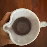 Antique stoneware pitcher with thistle motifs signed A Clement, Saint Paul