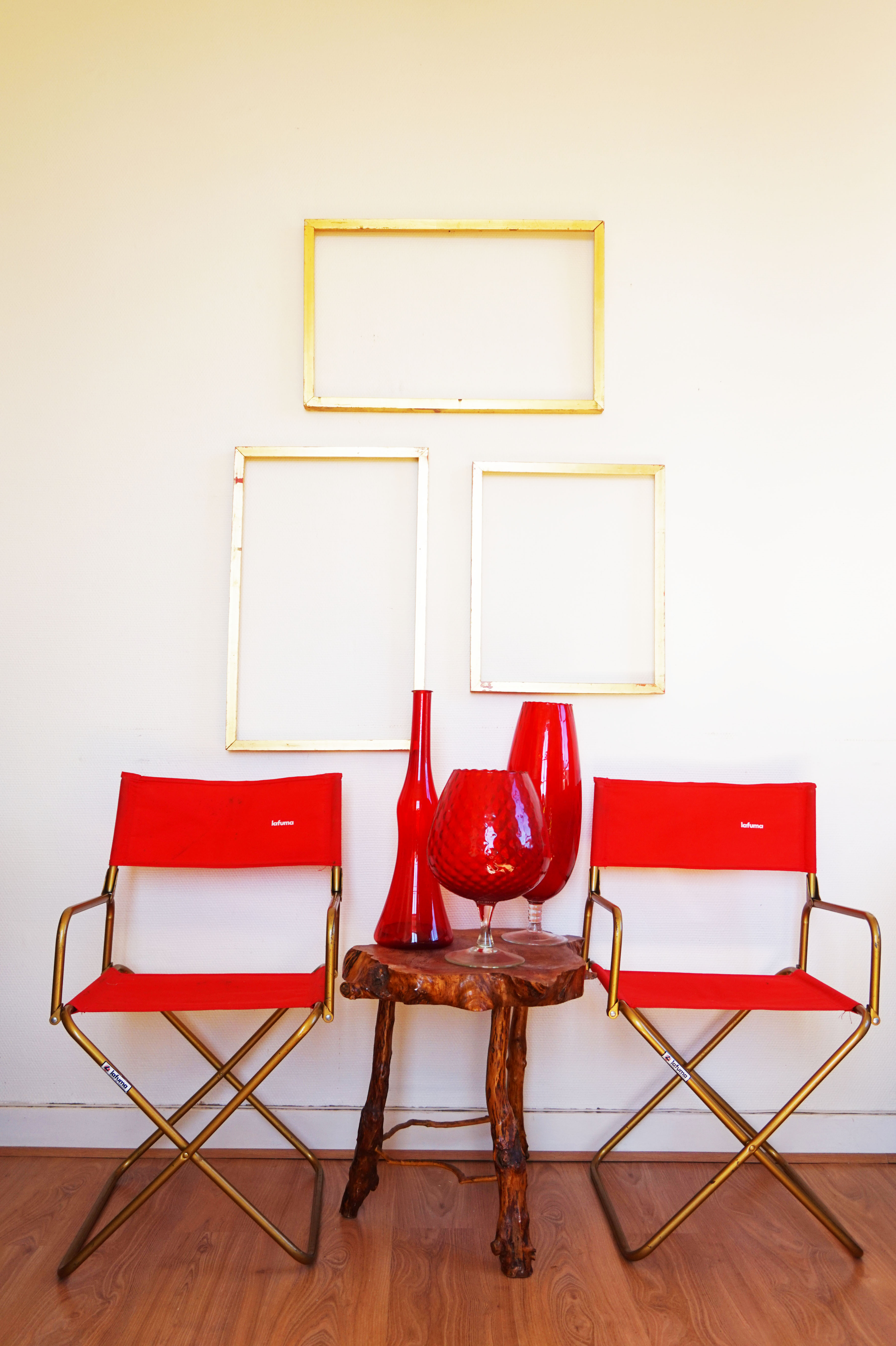 Red vintage pair of lafuma folding chairs