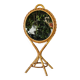 Vintage double-sided round mirror on a rattan stand.