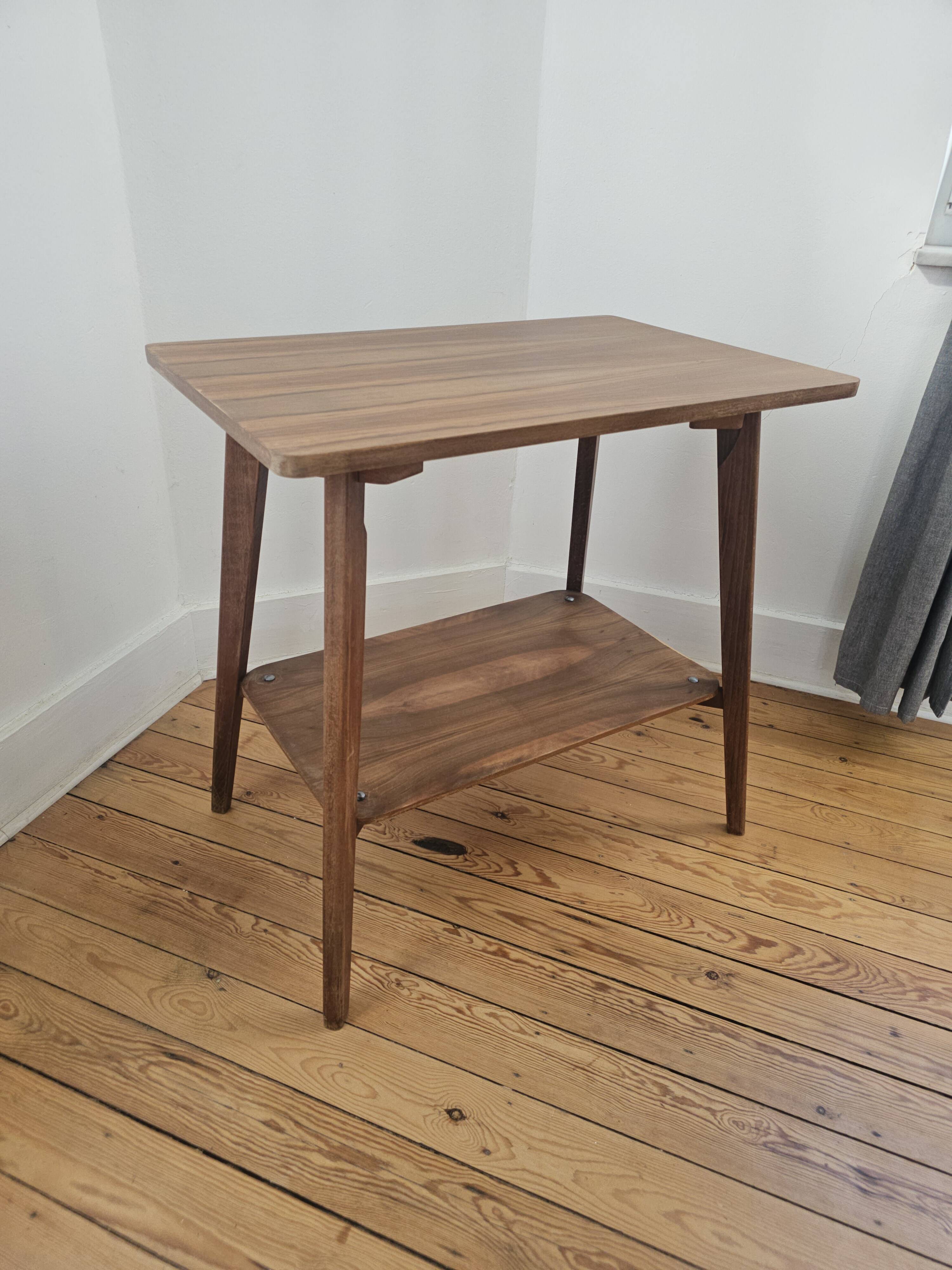 Vintage side table with double top in Scandinavian style.