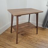 Vintage side table with double top in Scandinavian style.