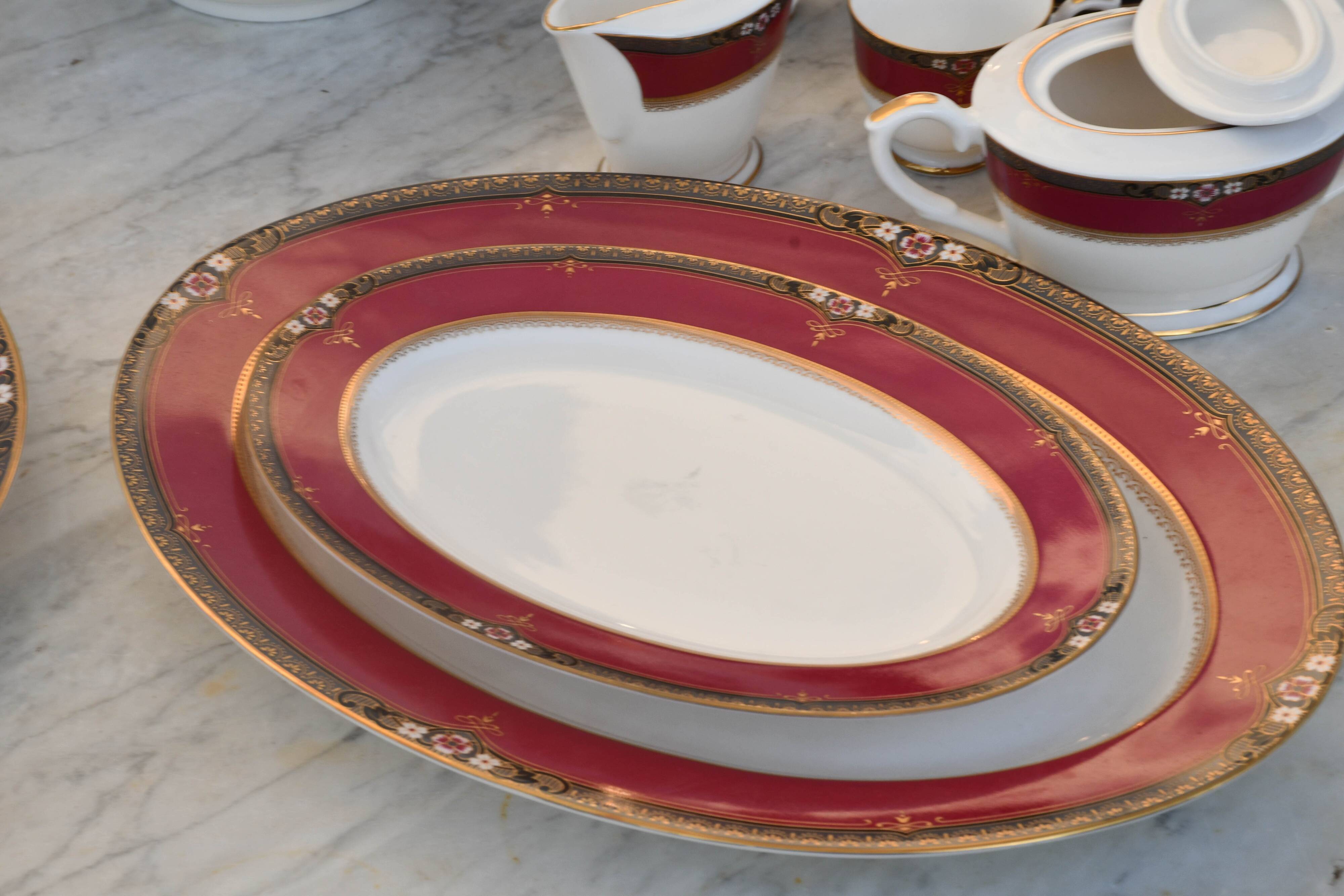 Elegant mid-century Japanese bone china service for 12 in white and noble red