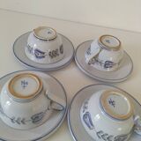 Glazed earthenware cups and saucers